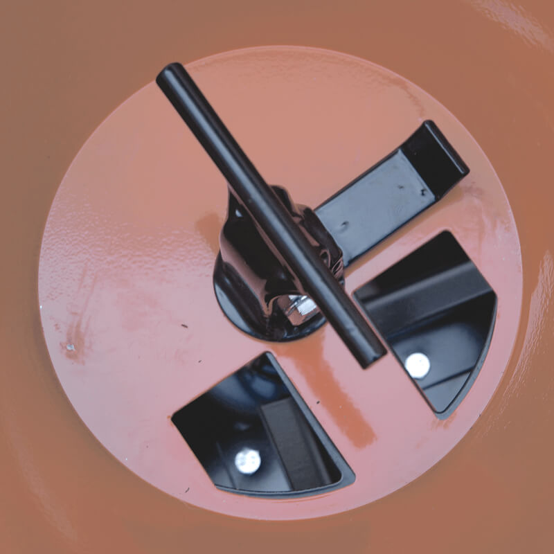 BEFCO Fertilizer Spreader top-down view, featuring a black handle and an orange container.