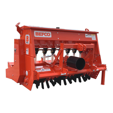 BEFCO Green-Rite Seeder and Aerator, red metallic finish with multiple seed drop tubes and wheels.