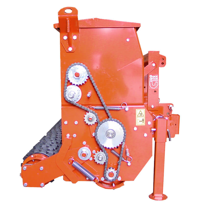 BEFCO Primary Seeder SRT angled view, orange with gears, chains, and adjustment handle.