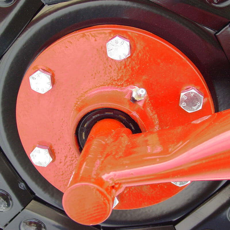 BEFCO RS2 Hay Rake close-up view, featuring a red arm and hexagonal bolts.