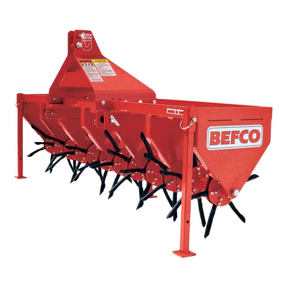 BEFCO 3 Point Core Aerator, red, angled view with multiple tines for effective soil aeration.