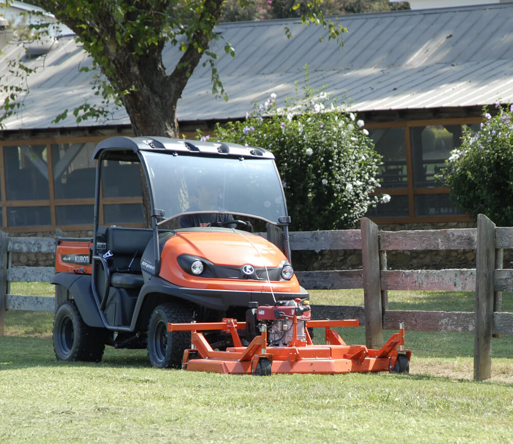 BEFCO Cyclone C30-CE5H Grooming Mower, front view, orange with rotary blades and wheels.