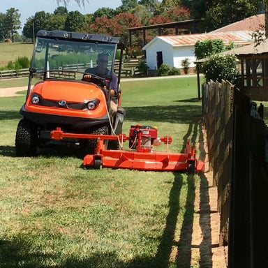 BEFCO Cyclone C30-CE5H Grooming Mower, orange, angled view with a powerful cutting deck and wheels.