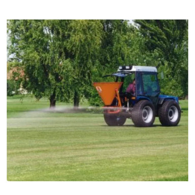 BEFCO Fertilizer Spreader on tractor, orange hopper, angled view, suitable for lawn care.