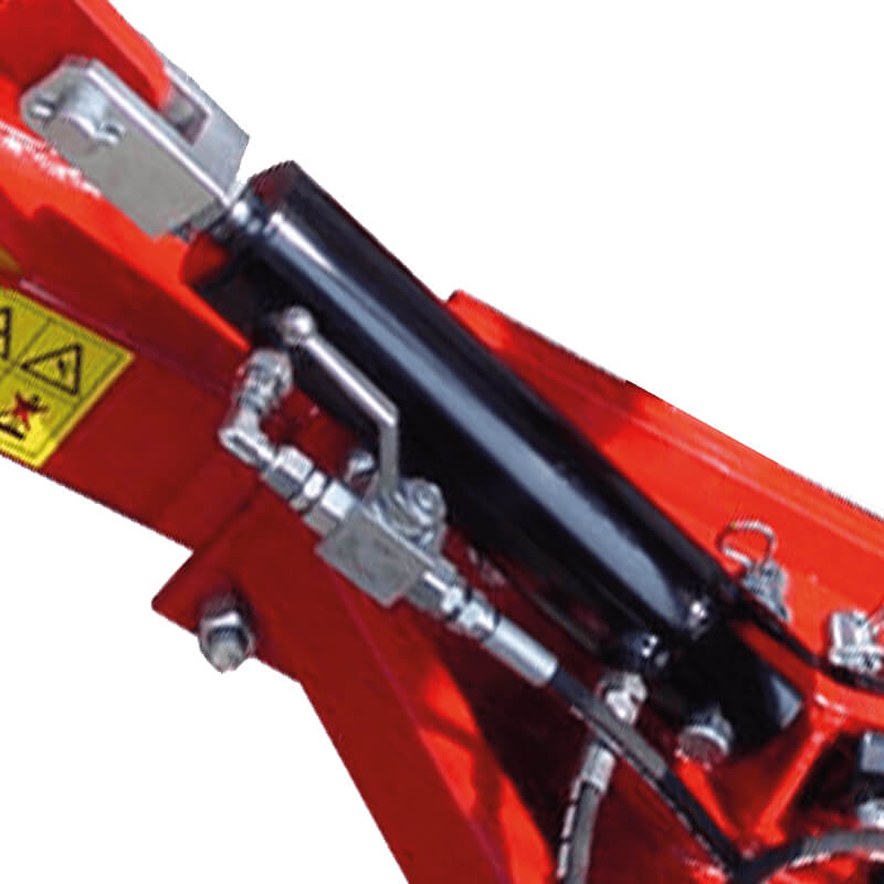 BEFCO Hay Rake hydraulic system, featuring red metal components and detailed mechanical parts.