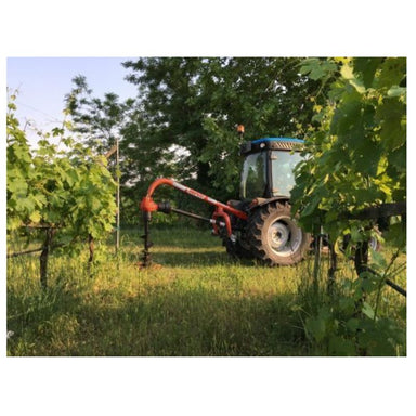 BEFCO PTO Post Hole Digger in red, angled view with attached auger for drilling holes.