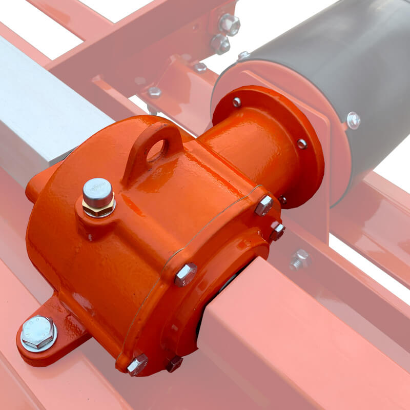 BEFCO T70 Rotary Tiller close-up, featuring an orange gearbox with metallic components and bolts.
