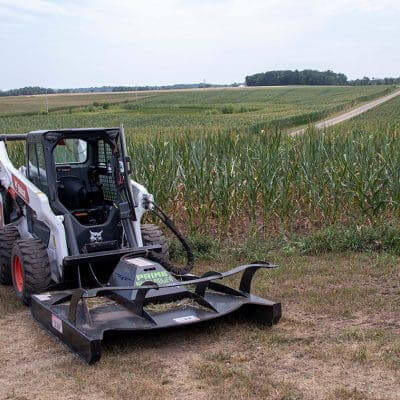 Brush Mower Attachment by Prime Attachments, black, angled view with robust cutting blades.