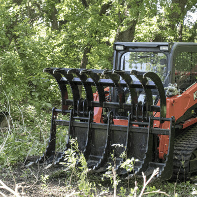 Clamshell Grapple for Skid Steer, angled view, black with multiple claws for efficient grasping.