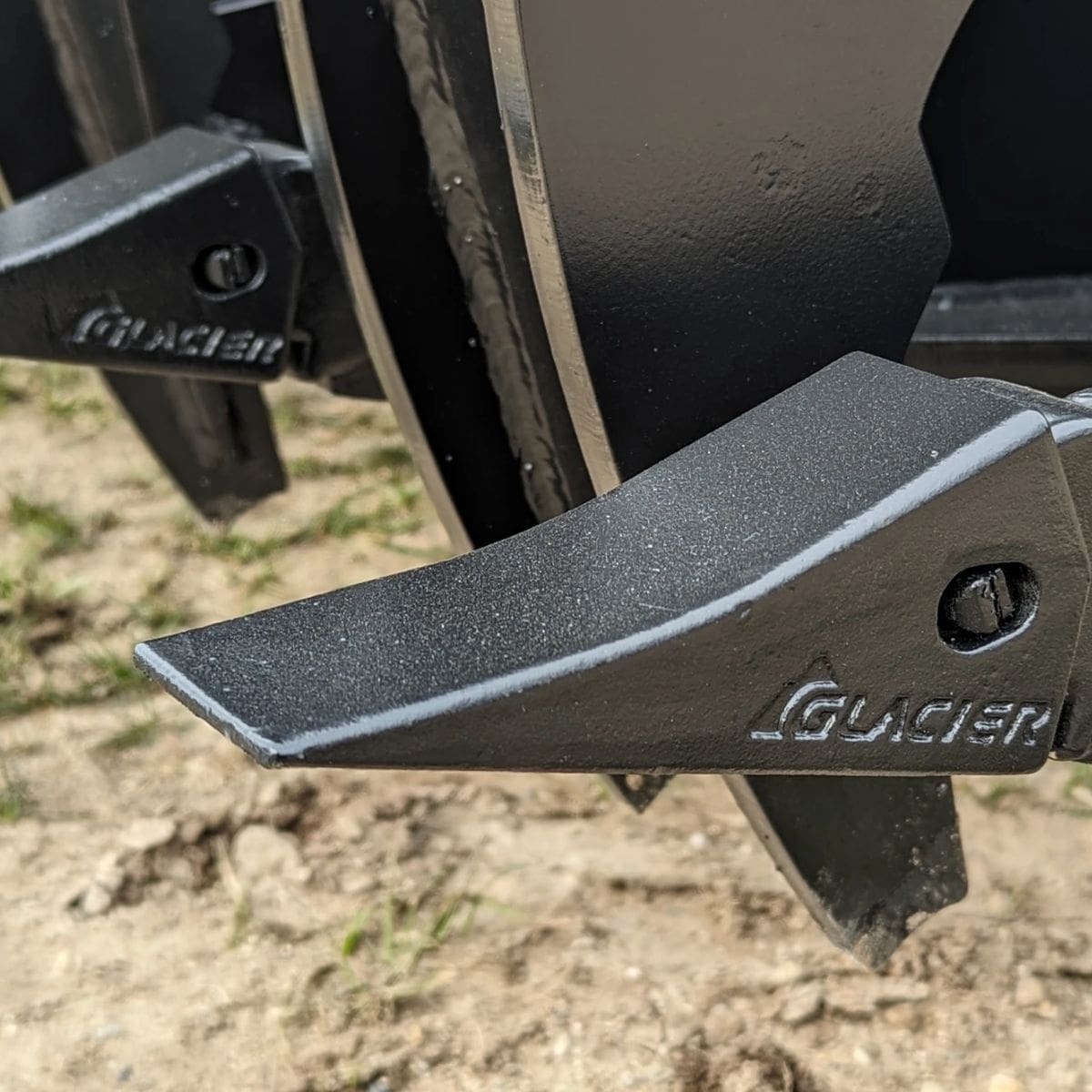Extreme Duty Rake Grapple — Glacier Attachments - Claw Logo