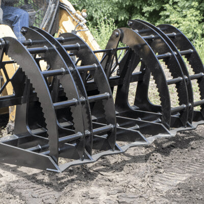 Forestry Grapple for Skid Steer by Prime Attachments, black, front view, highlighting curved claws.