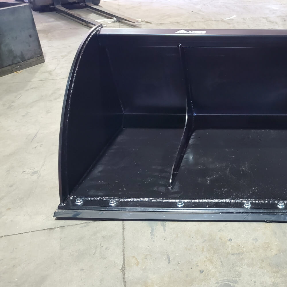 Glacier Attachments skid steer snow bucket, front view, black with reinforced edges and inner dividers.
