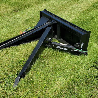 Glacier Stump Shark angled view, black with serrated edges and hydraulic connections.