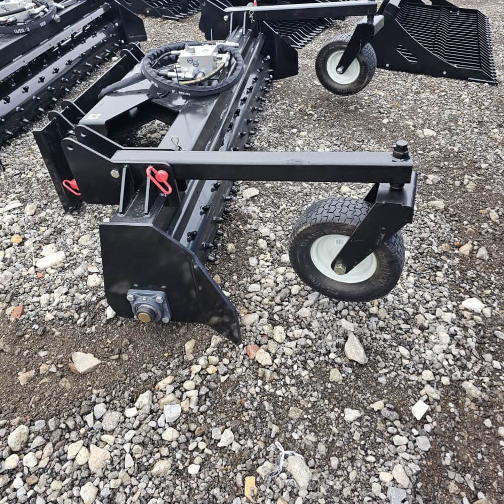 HD Soil Conditioner by Prime Attachments, black, angled view with hydraulic controls and wheels.