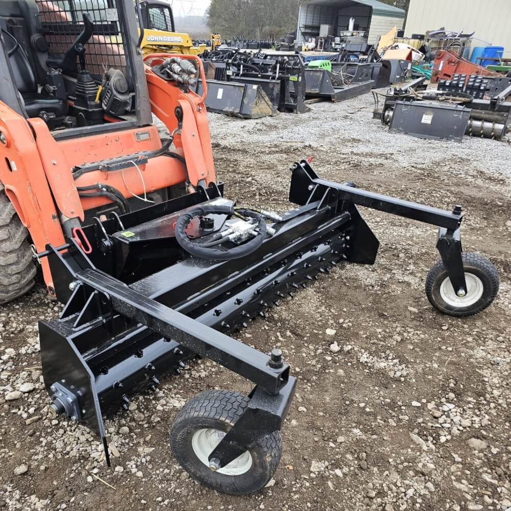 HD Soil Conditioner by Prime Attachments, black, front view with wheels and adjustable features.