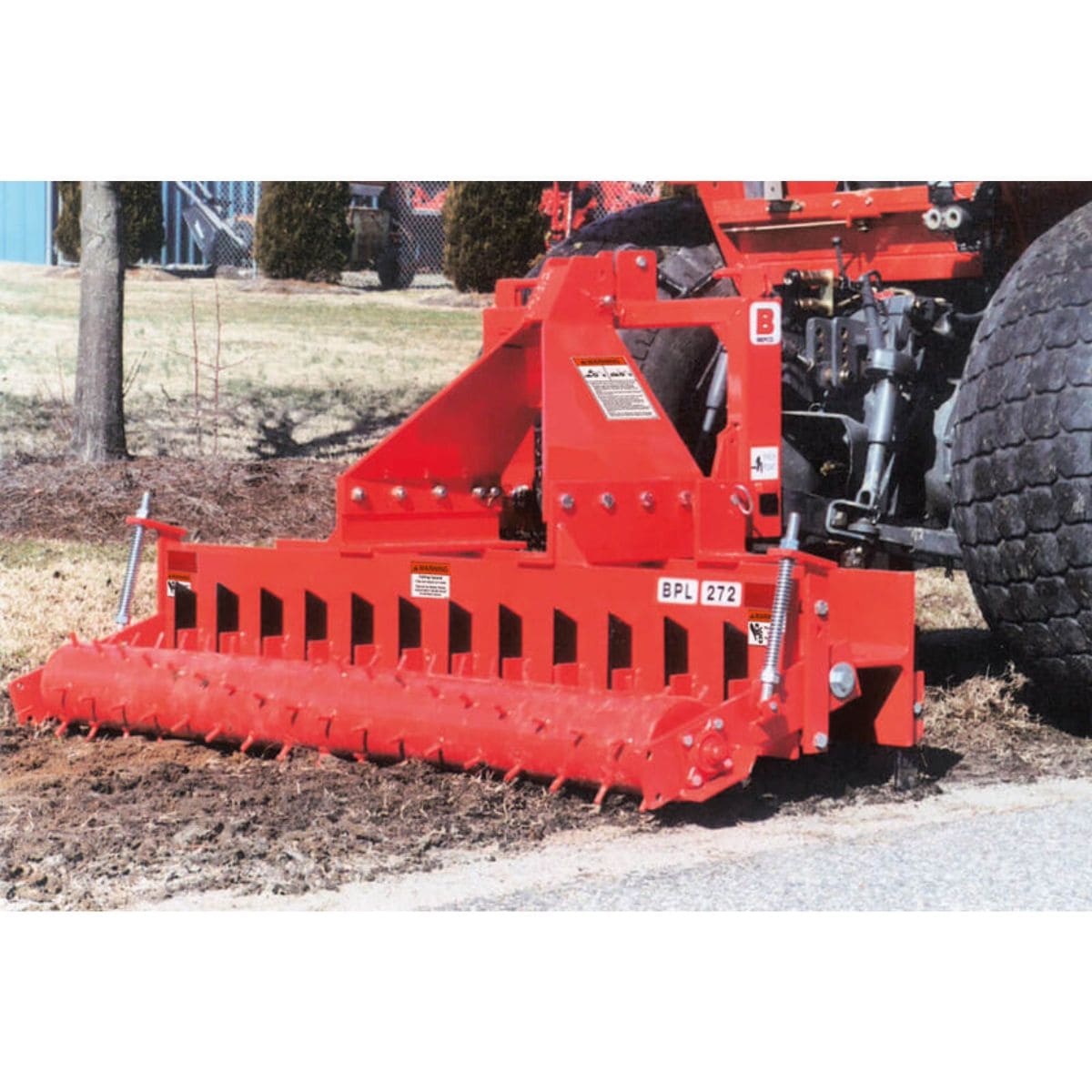 Heavy Duty Soil Pulverizer by BEFCO, red, angled view with rolling tines and adjustment features.