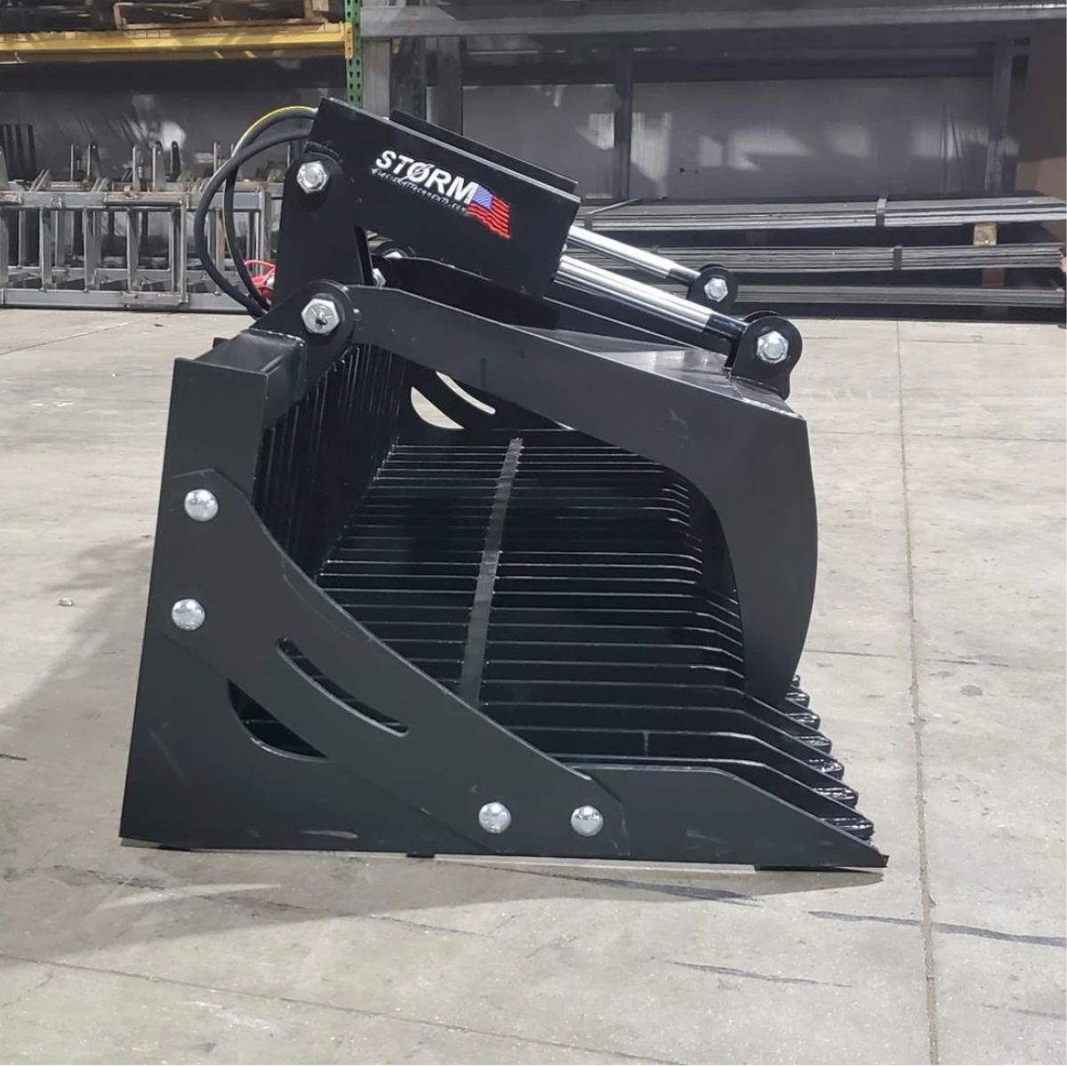 Rock / Brush Grapple — Storm Attachments - Right Side Logo