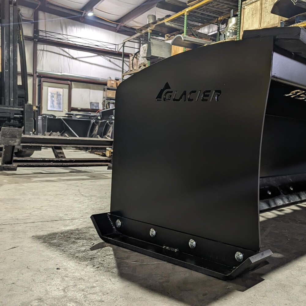 Skid Steer Heavy Duty Snow Pusher by Glacier, front view, sleek black design, robust construction.