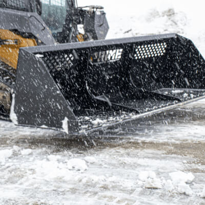 Skid Steer Snow Bucket by Prime Attachments, heavy-duty black design with open front grating.
