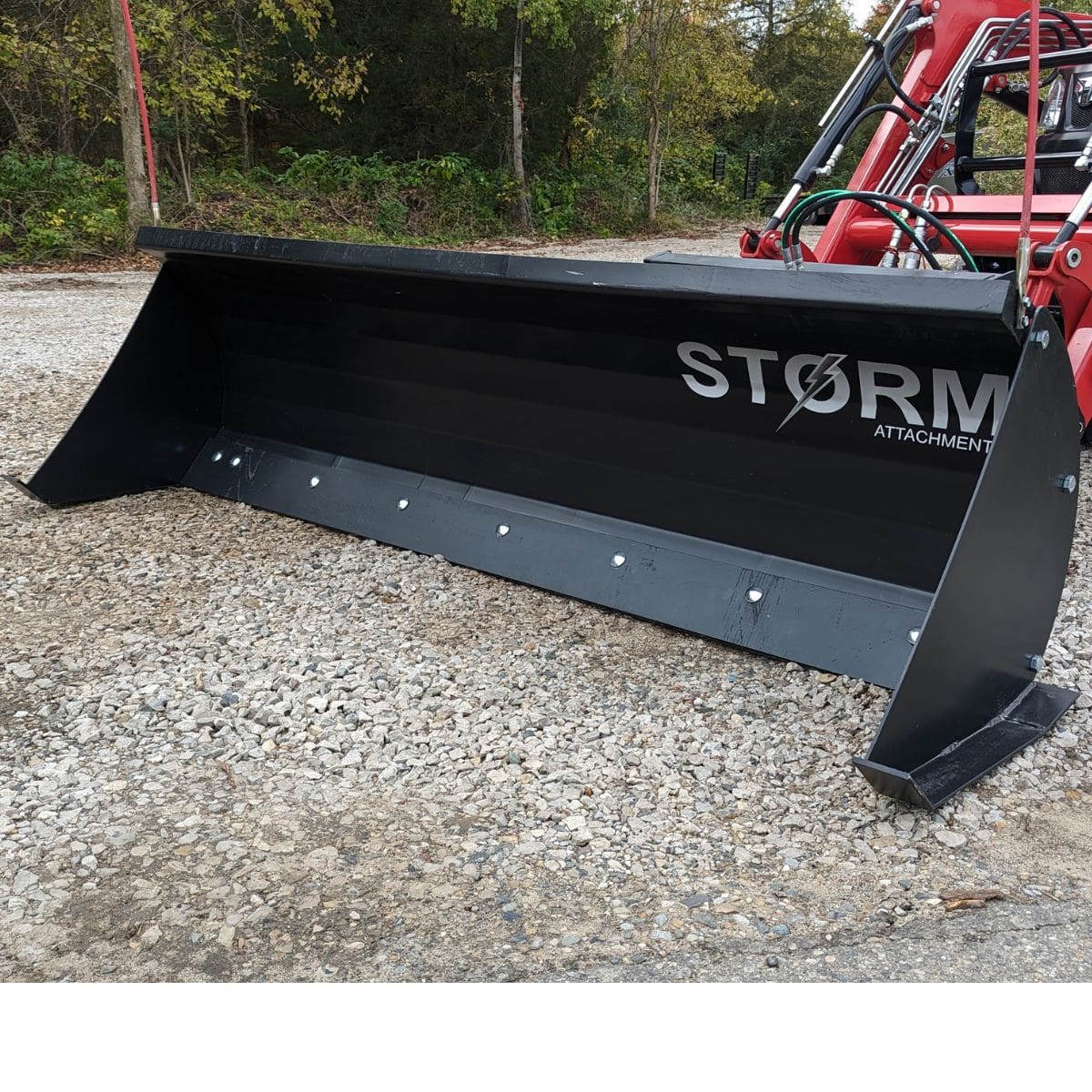 Snow Blade Side Kit  on a Red Tractor