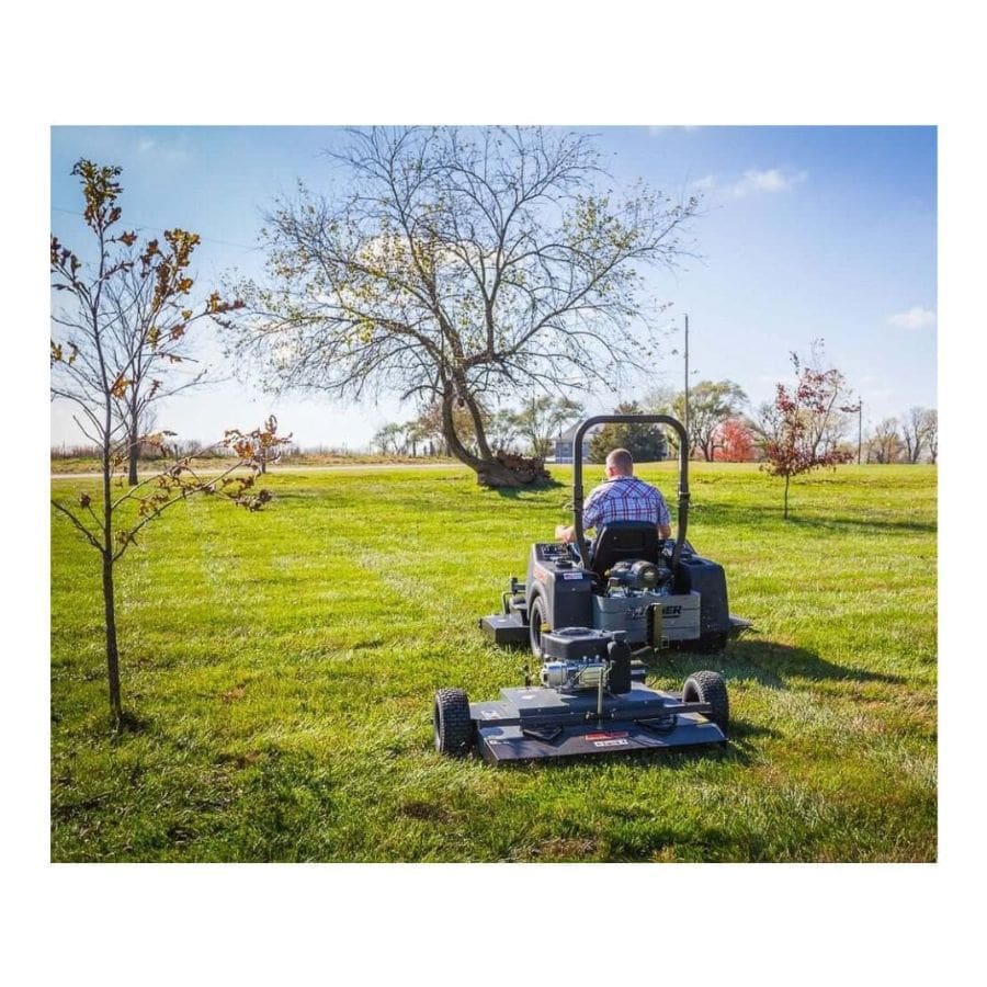 Swisher 44 Finish Cut Mower, black and gray, rear view with large wheels and mower deck.