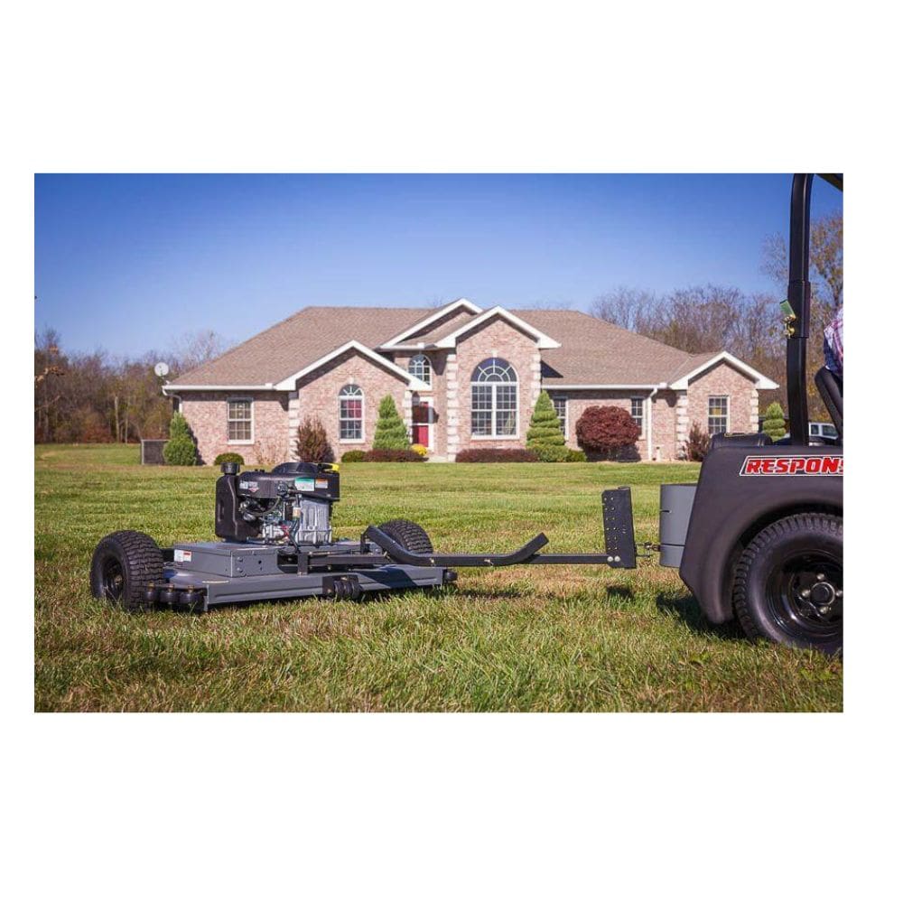 Swisher 44 Trail Mower with 11.5 HP engine, gray with large rear wheels and tow attachment.