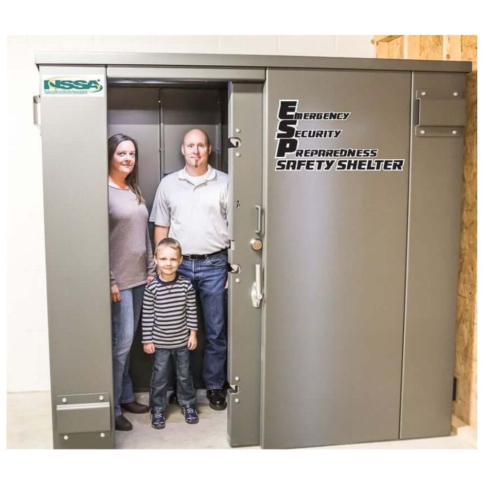 Swisher 6 Person ESP Safety Shelter front view, gray metal construction with a secure locking mechanism.