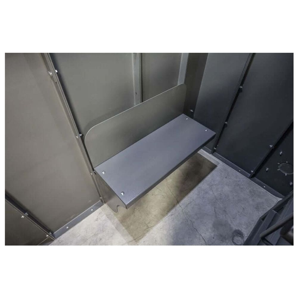 Swisher 6 Person ESP Safety Shelter interior view, featuring a gray bench and sturdy walls.