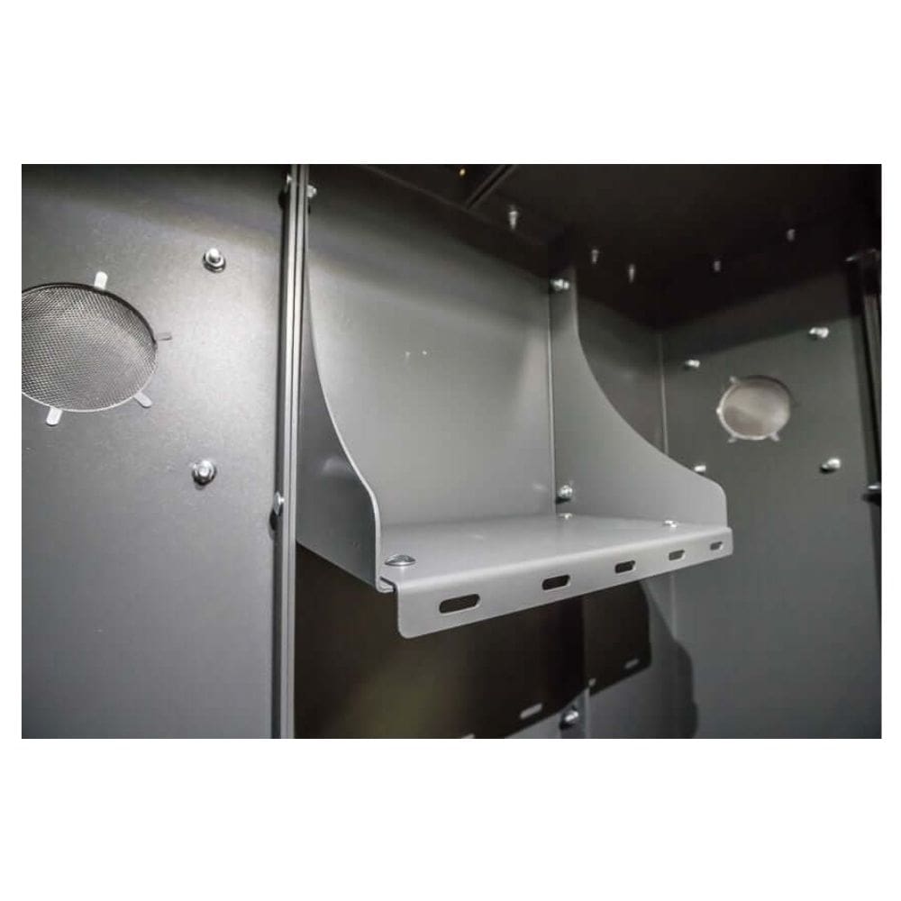 Swisher 6 Person ESP Safety Shelter internal view with gray metal shelves and ventilation openings.