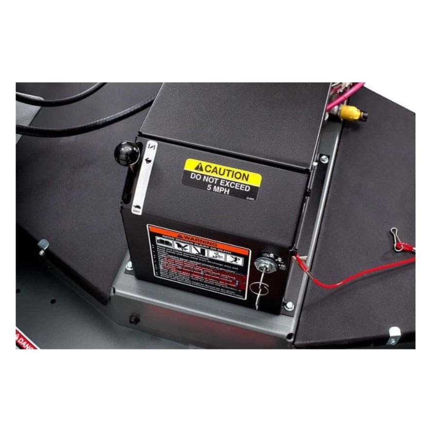 Swisher 60" Trail Mower with caution signs, 12V battery compartment, and detailed controls view.