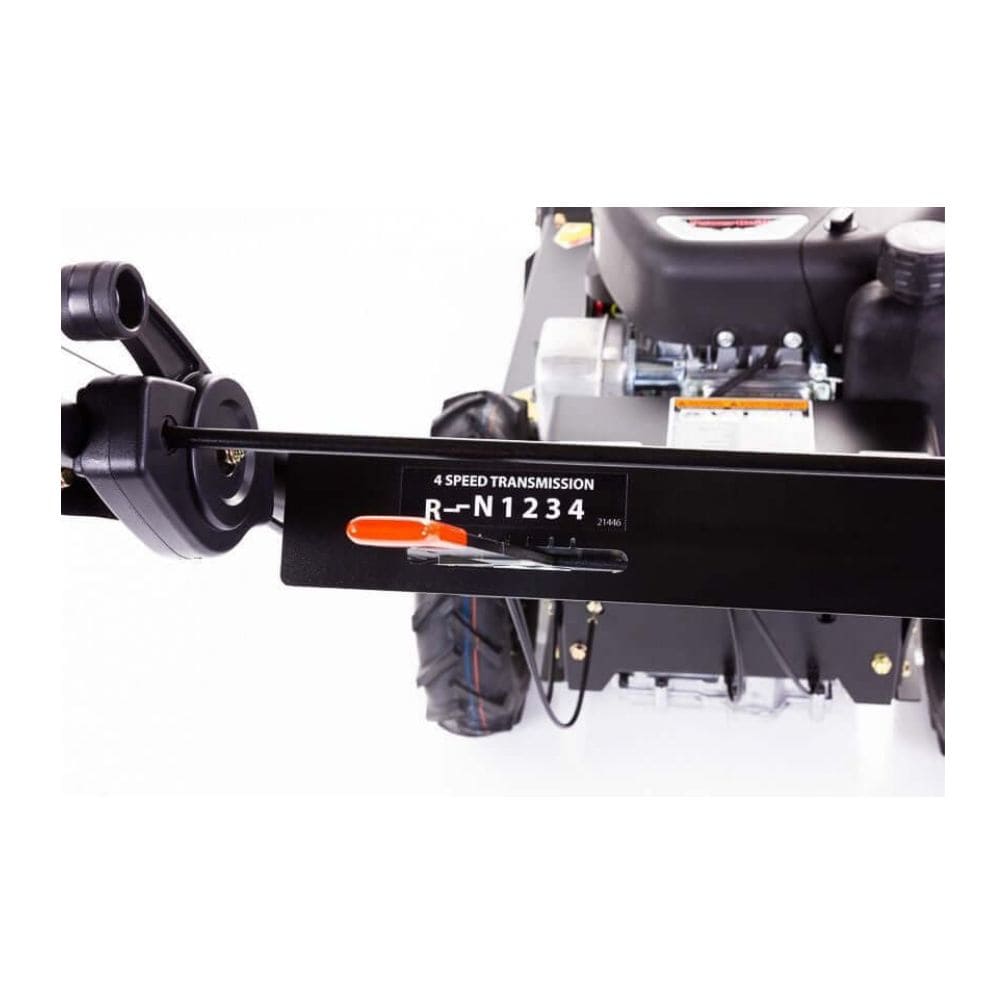 Swisher Predator 24" Walk Behind Rough Cut Mower angled view, featuring controls and robust tires.