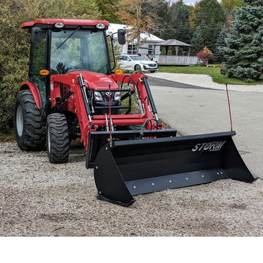 Tractor with Snow Blade Attachment and Side Kit
