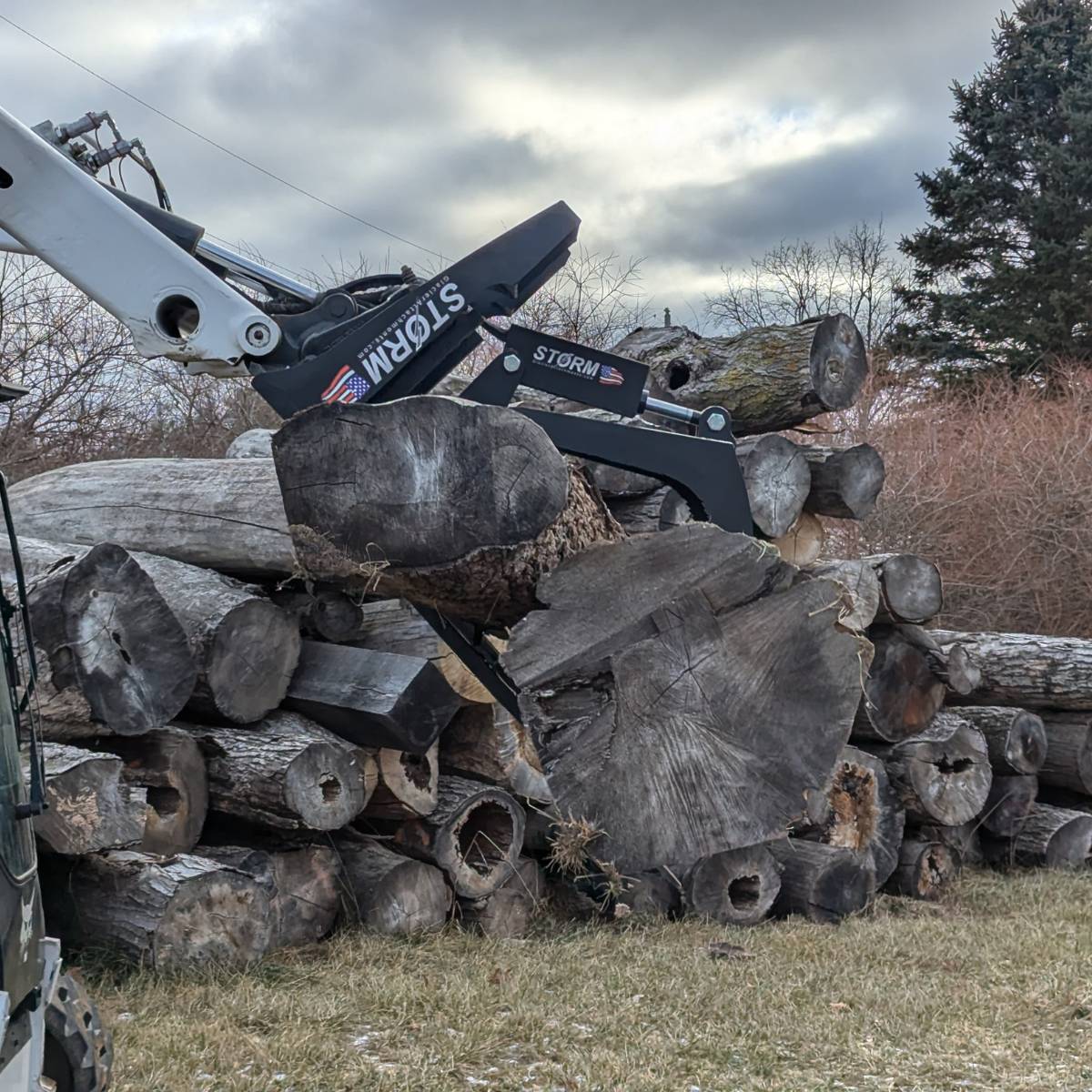 Storm Attachments Fork Grapple Attachment in use version 2