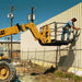 Star forklift safety work platform raised at jobsite