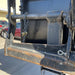 Star forklift trash hopper connection close-up