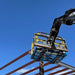 Star forklift work platform being lifted onsite