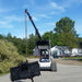 20 Ft Skid Steer Truss Boom by Glacier Attachments, angled view with a heavy-duty hook and chain.