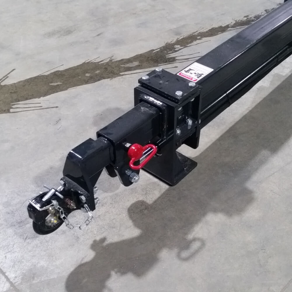 20 Ft Skid Steer Truss Boom by Glacier Attachments, black, side view with hitch and fittings.