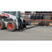 5500 Lb Skid Steer Forks attached to Bobcat