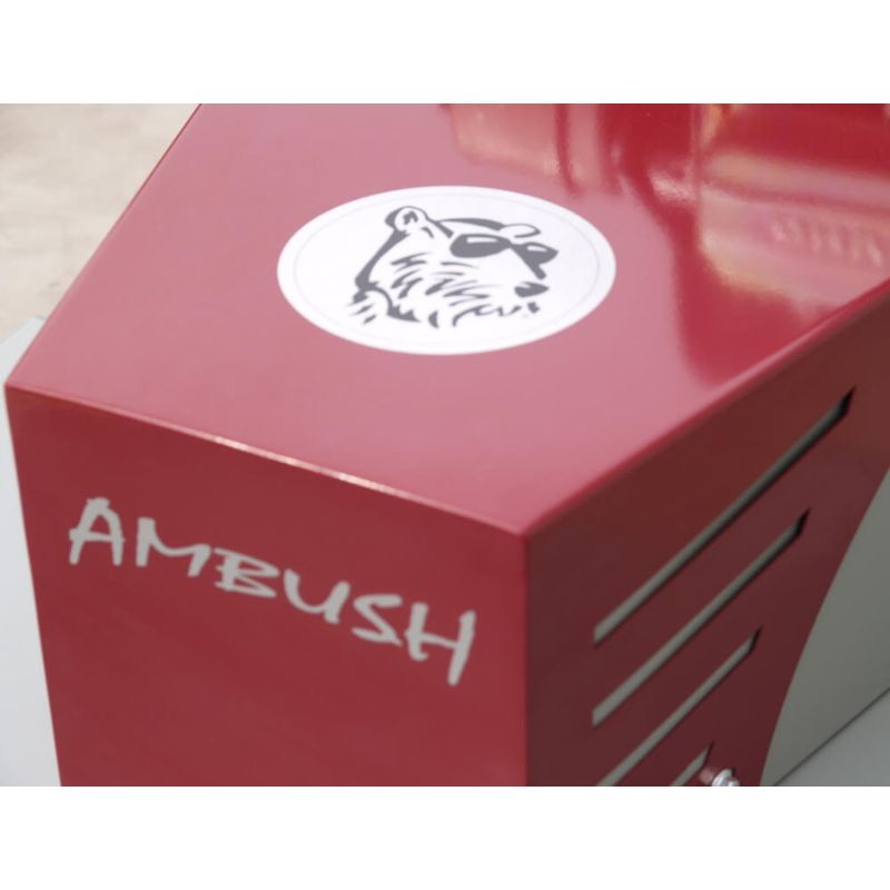 Ambush Brush Mower 26 In 10.5 HP, red with logo and angled view, featuring a sleek design.