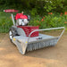 Ambush Brush Mower 26 In 10.5 HP Power Dog, red and gray with front view and large tires.