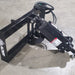 Glacier Auger Drive Unit for Skid Steer, black with hydraulic motor, angled view.