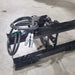 Glacier Attachments Auger Drive Unit for Skid Steer, black with hydraulic hoses and sturdy frame.