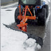 BEFCO 3 Point Rear Blade for Tractor, orange with a black blade, angled view clearing snow.