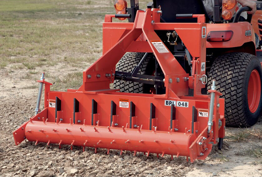 BEFCO 3 Point Soil Pulverizer in orange, angled view with visible tines and attachment features.