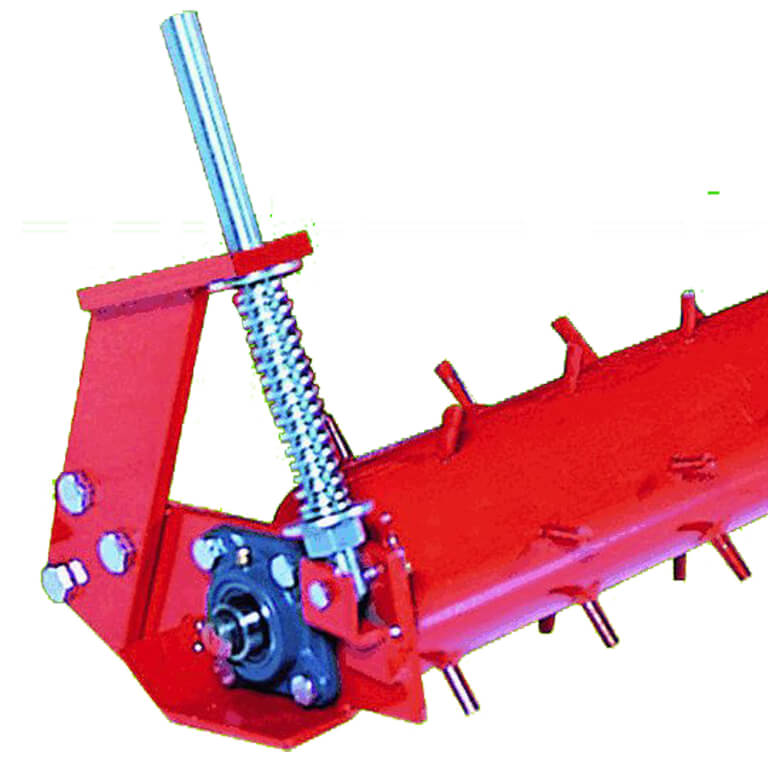 BEFCO 3 Point Soil Pulverizer in red, angled view with adjustable spring and mounting features.