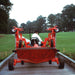 BEFCO Cyclone Super Flex Gang Grooming Mower, red, rear view with multiple cutting decks and wheels.