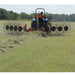 BEFCO Hay Rake rear view, red and black with multiple tine wheels for efficient hay raking.