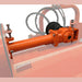 BEFCO Hurricane H40-S Flail Mower close-up view of orange attachment with hose and connected components.
