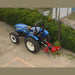 BEFCO Sickle Bar Mower angled view, red and black with sharp cutting blades attached to a tractor.